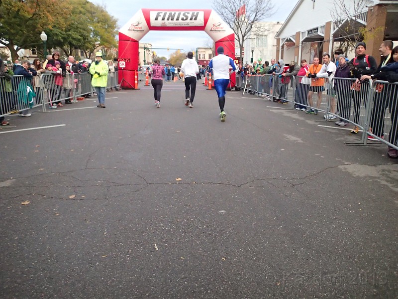 2013 Wicked 10K 160.JPG - 60 minutes later the end is in sight!